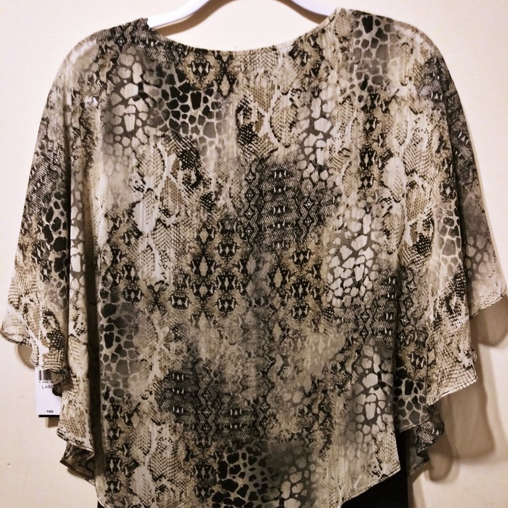 Womens leopard print top with tags